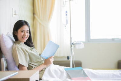 Woman in hospital bed awaiting surgery at University of Colorado Urogynecology | Denver, CO